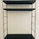 Vintage adjustable “string” shelf in metal and brass, Circa 60's