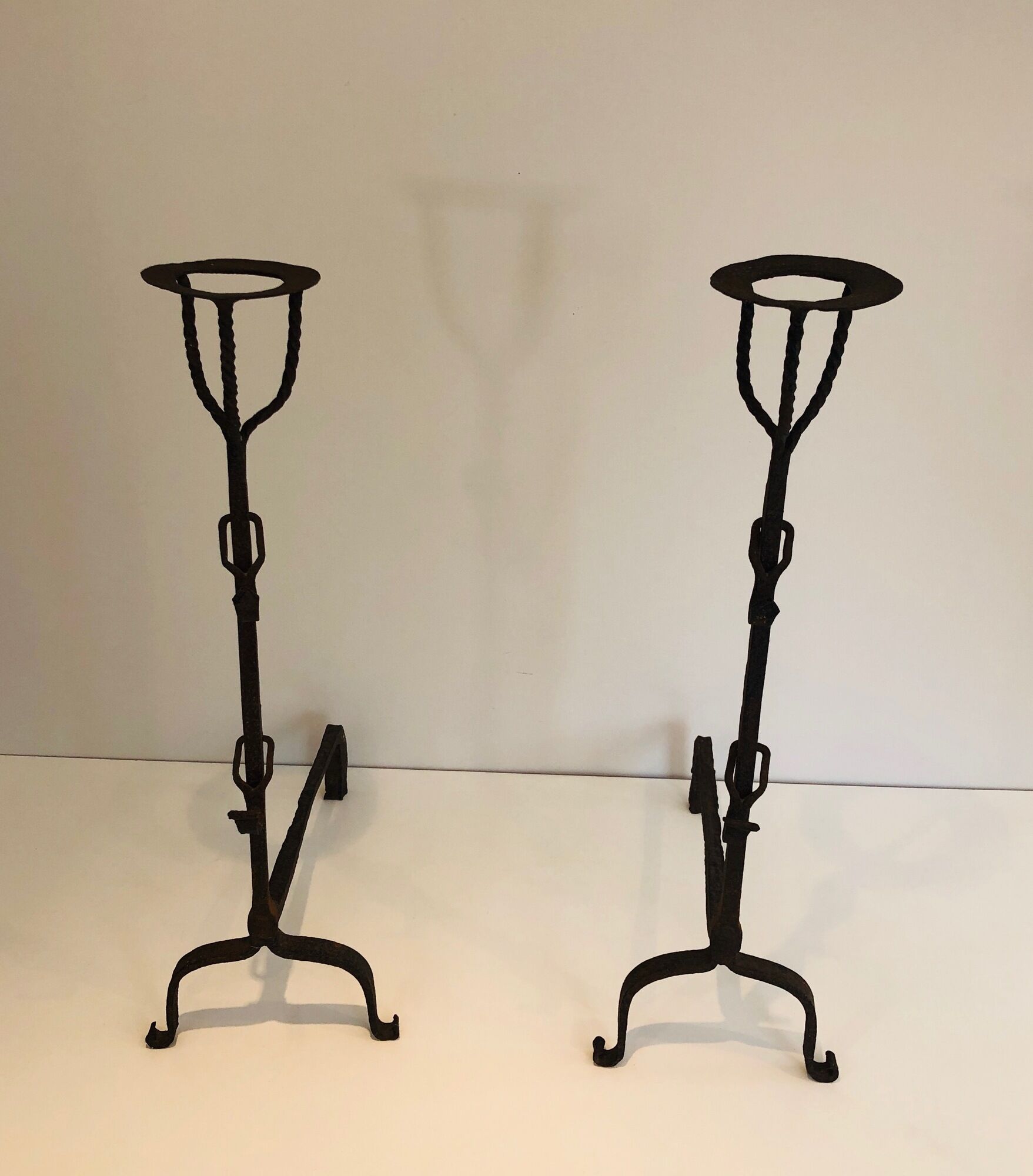 Pair of wrought iron landiers. french work ,seventeenth century
