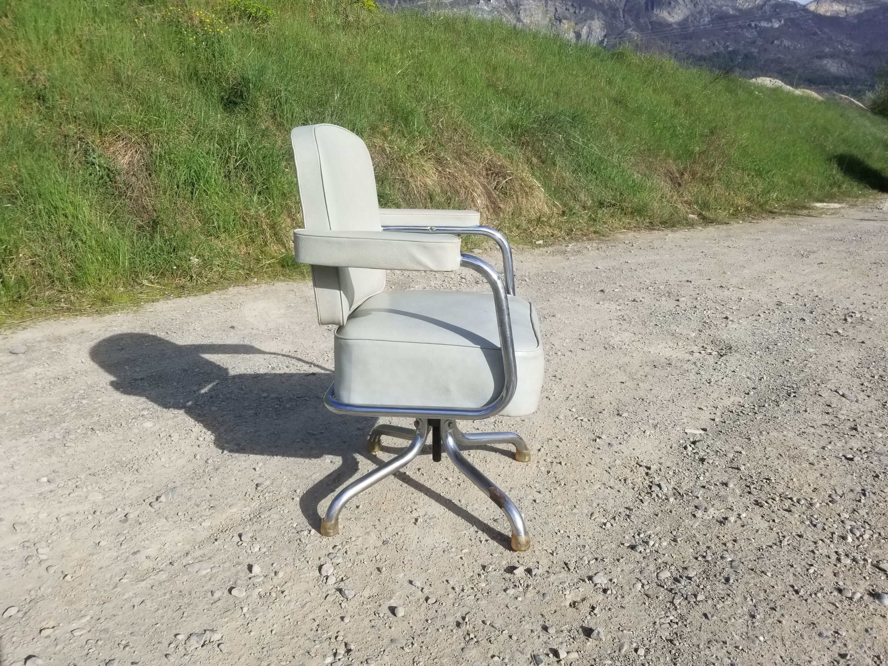 Old light grey pullman swivel office chair