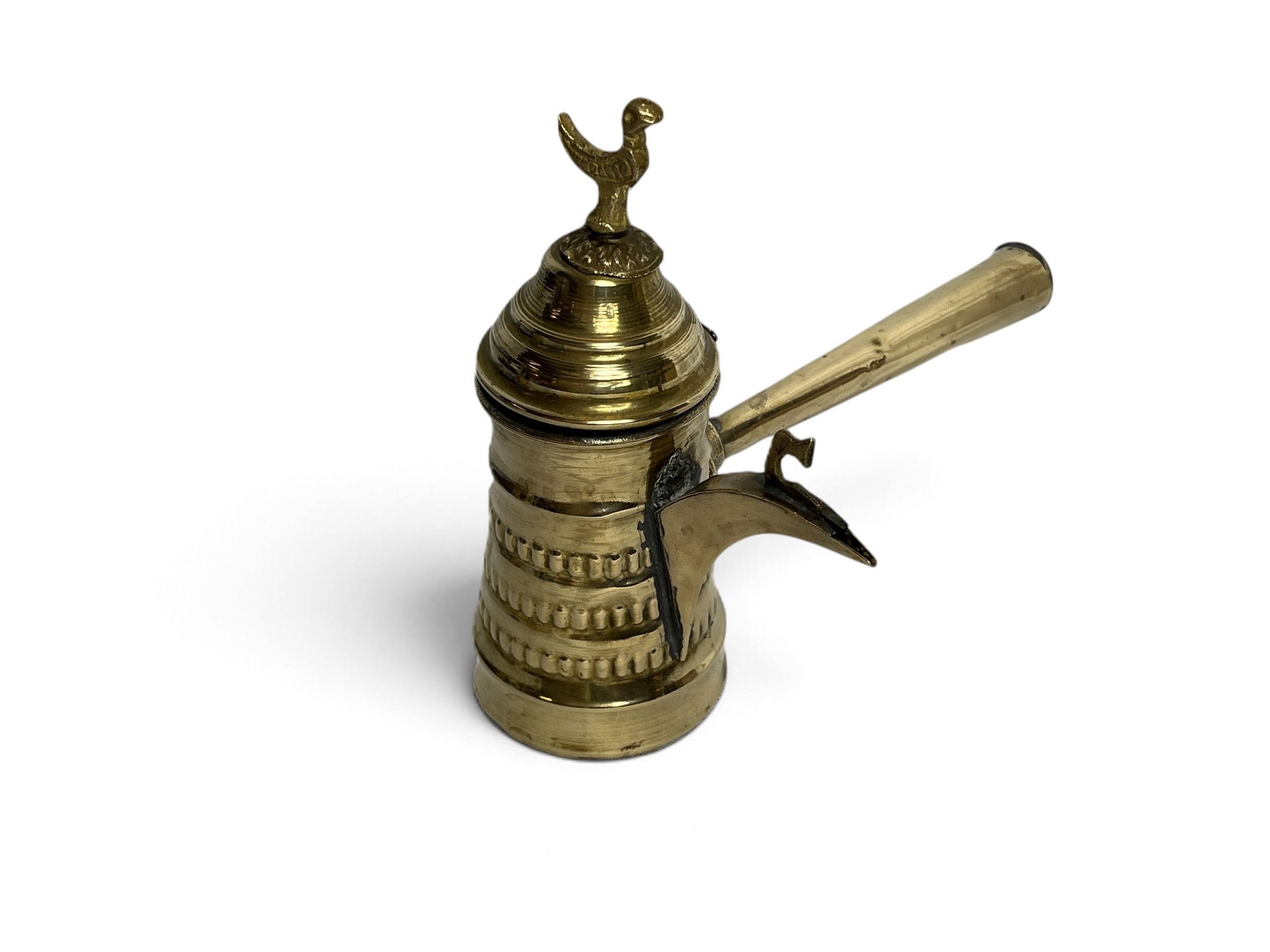 Brass dallah coffee pot with bird-shaped finial, 20th century.