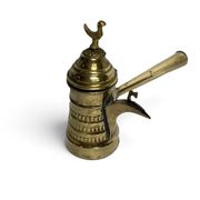 Brass dallah coffee pot with bird-shaped finial, 20th century.