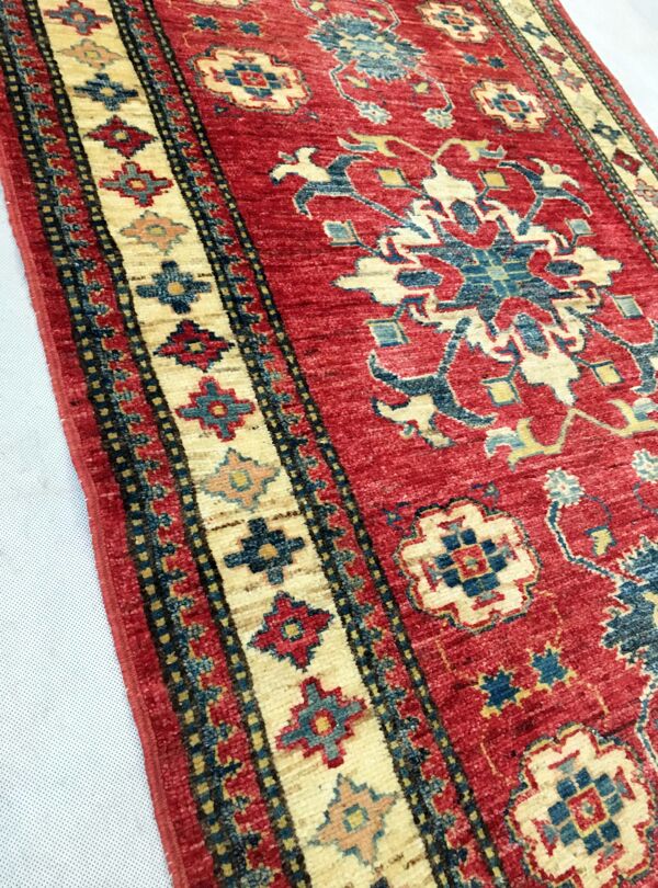 Remarquable tapis d'Orient: Kazak ancien 310x84 cm