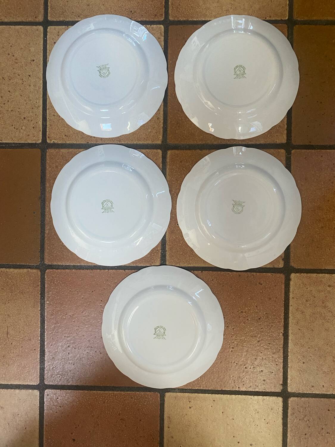 Set of 5 flat ironstone plates stamped Laveno