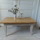 Vintage coffee table patinated pearl gray waxed finish, top against glued varnished oak