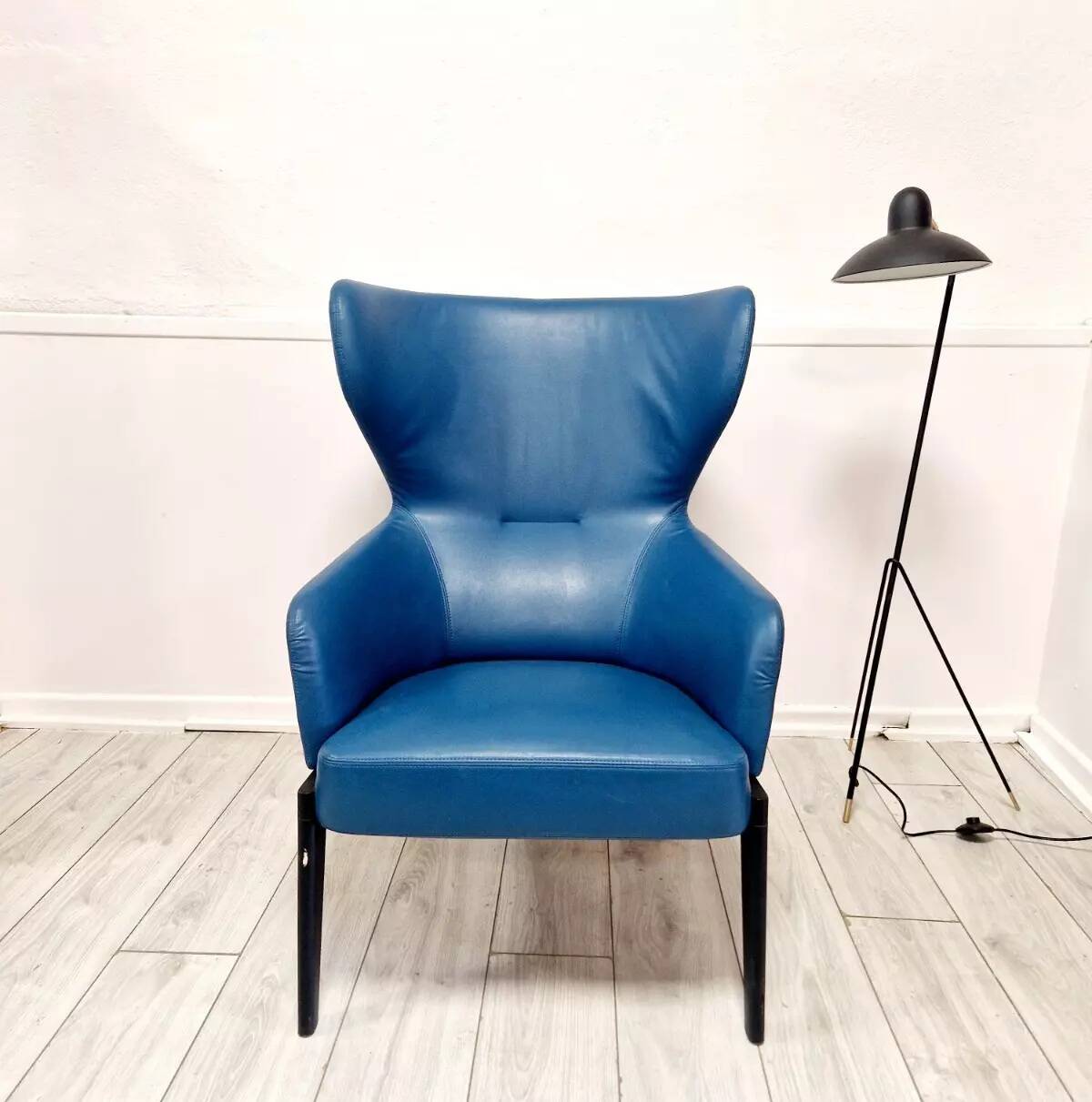 High-back armchair by Rodolfo Dordoni
