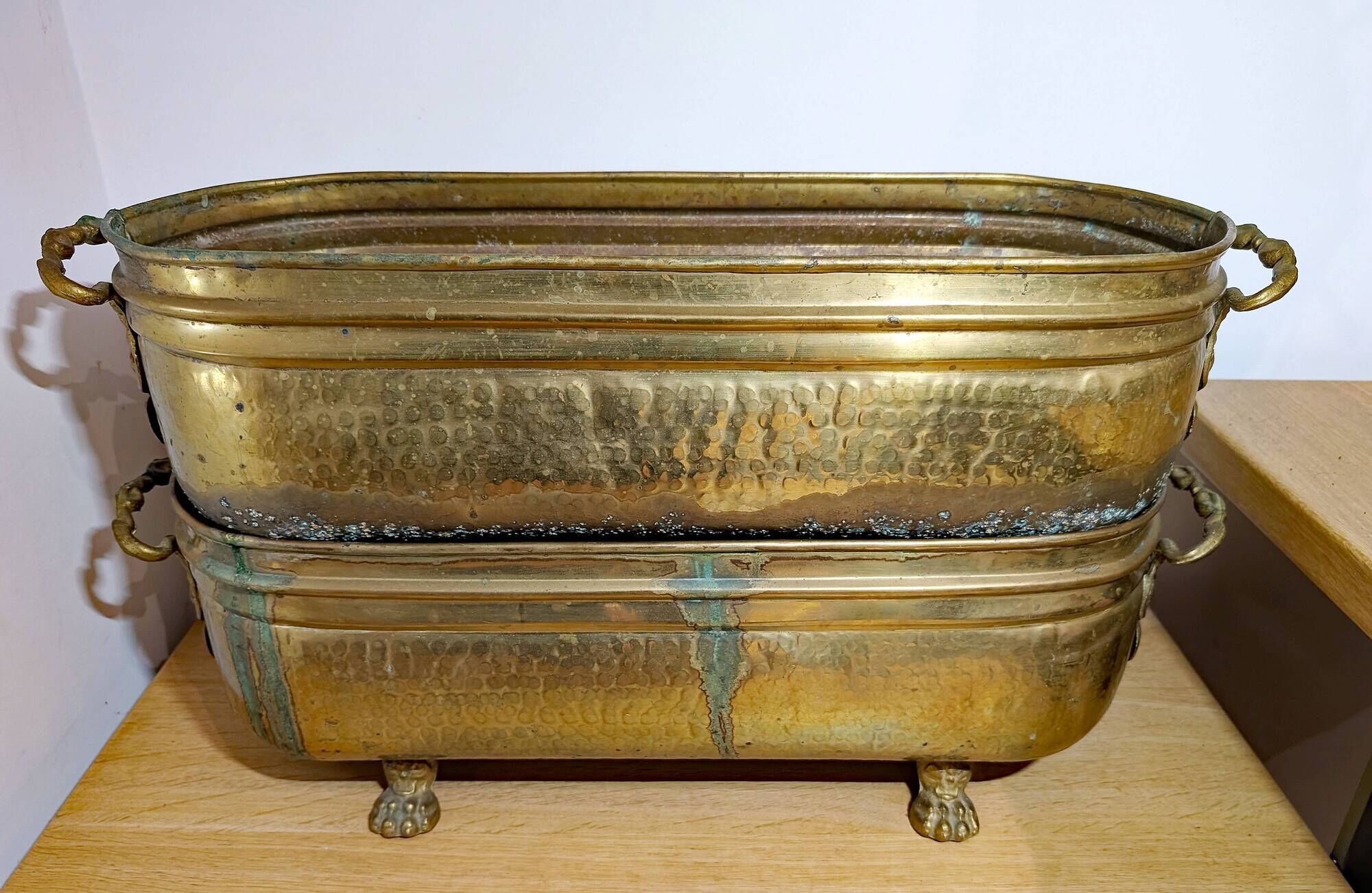 Pair of large antique planters with lion's paw feet.