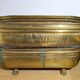 Pair of large antique planters with lion's paw feet.
