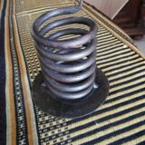 Spiral metal candle holder spring with candle, bronze appearance