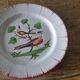 Antique plate with birds