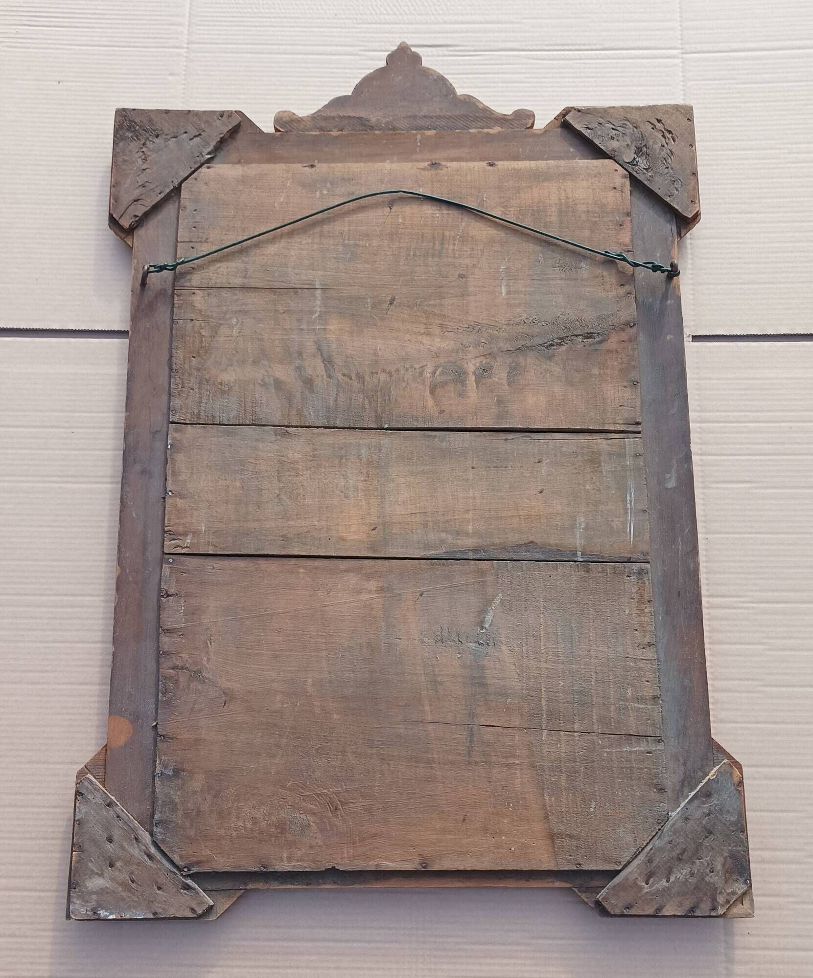 Louis XVI mirror in carved wood, 19th century.