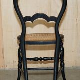 Four antique Regency bergère chairs with mother-of-pearl inlay.