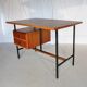 Modernist vintage desk in wood and black lace-up steel