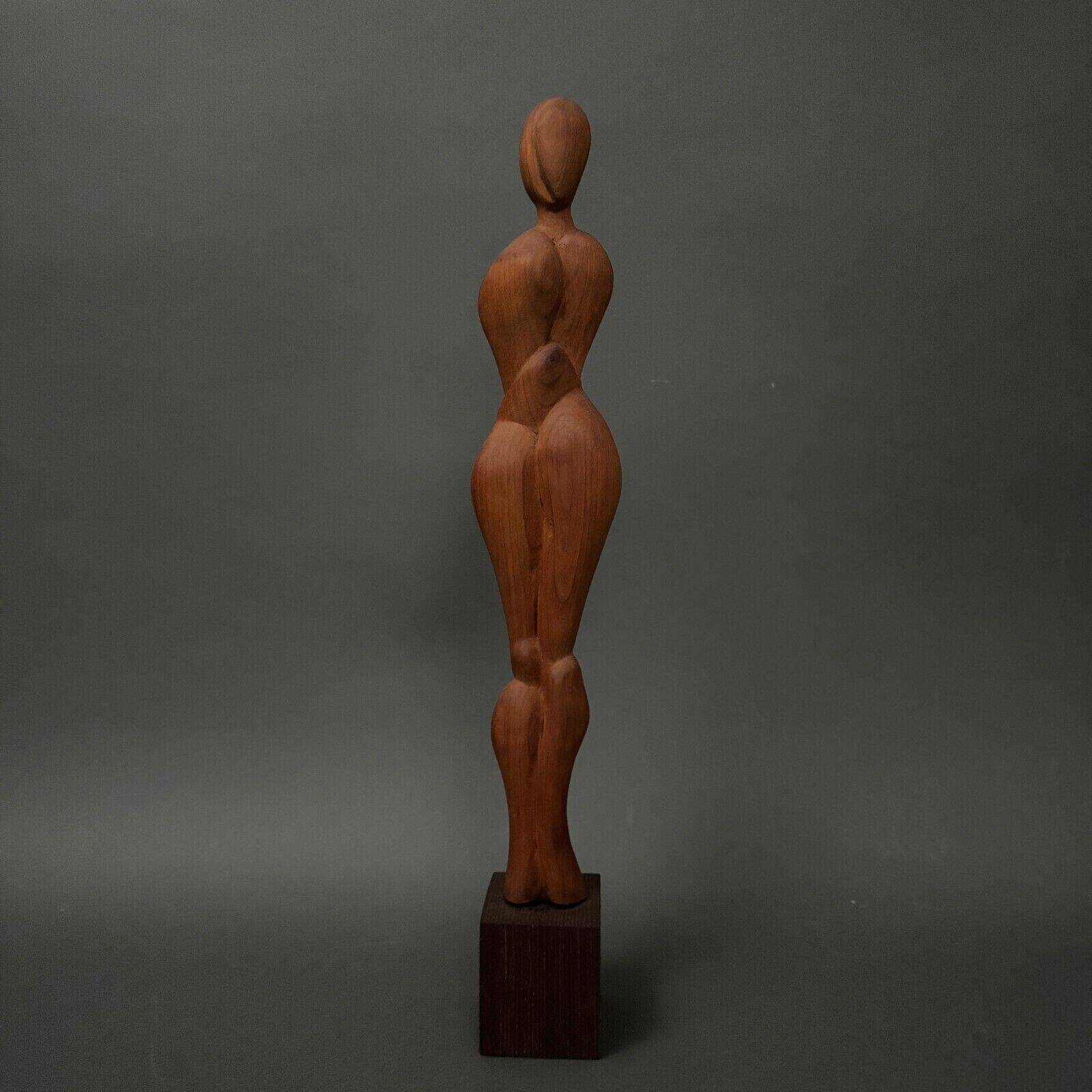 Carved wooden sculpture of a woman by Calin Hentea, 20th century