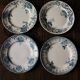 A set of 4 flat plates Terre de fer mismatched blue
