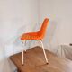 Chair with openwork plastic shell 1970
