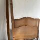 Old wooden and cane bed