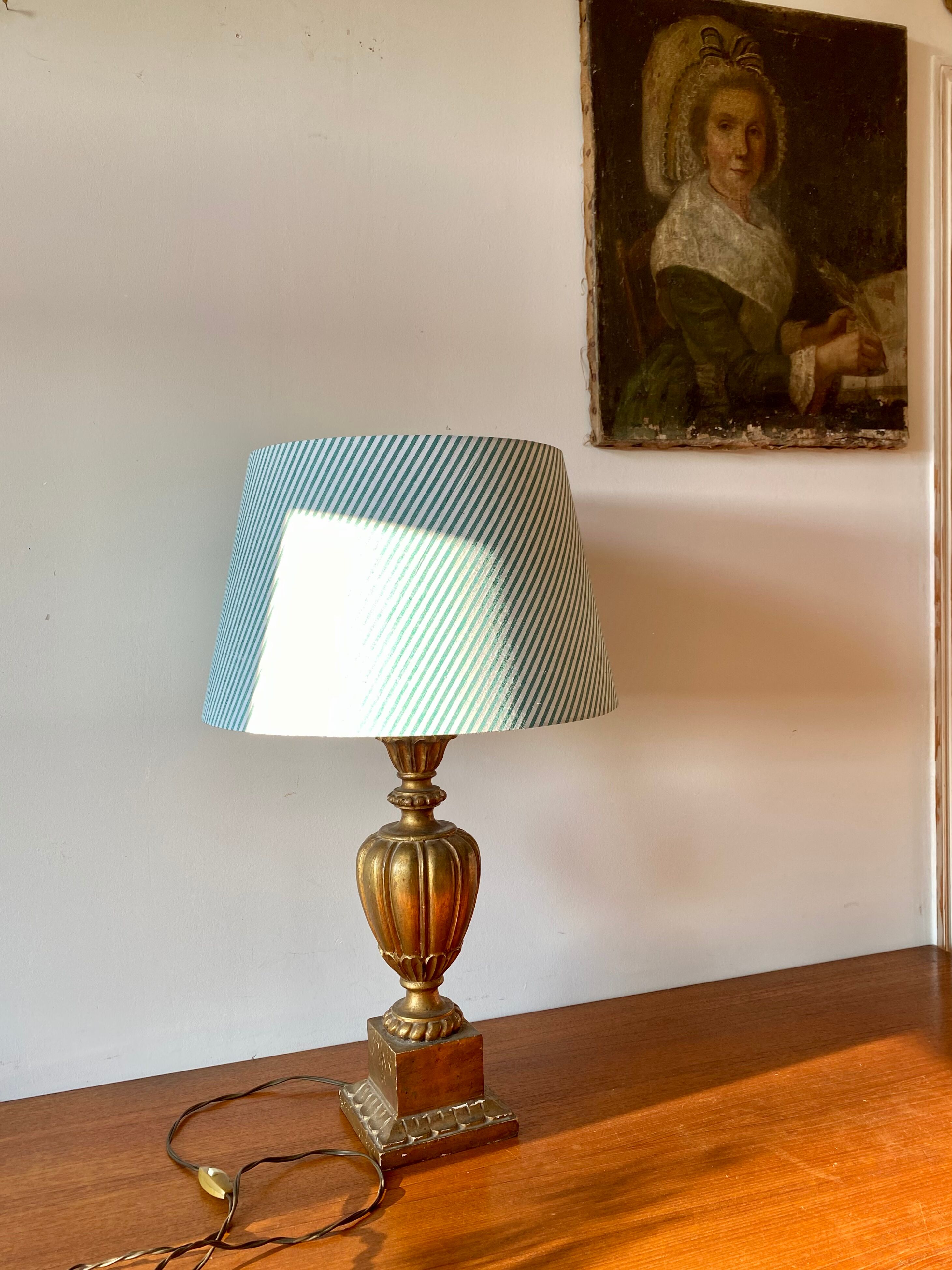 Gilded wooden lamp