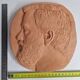 Bas-relief mural in terracotta, profile of a man, signed, 21 x 20 cm, 1984.
