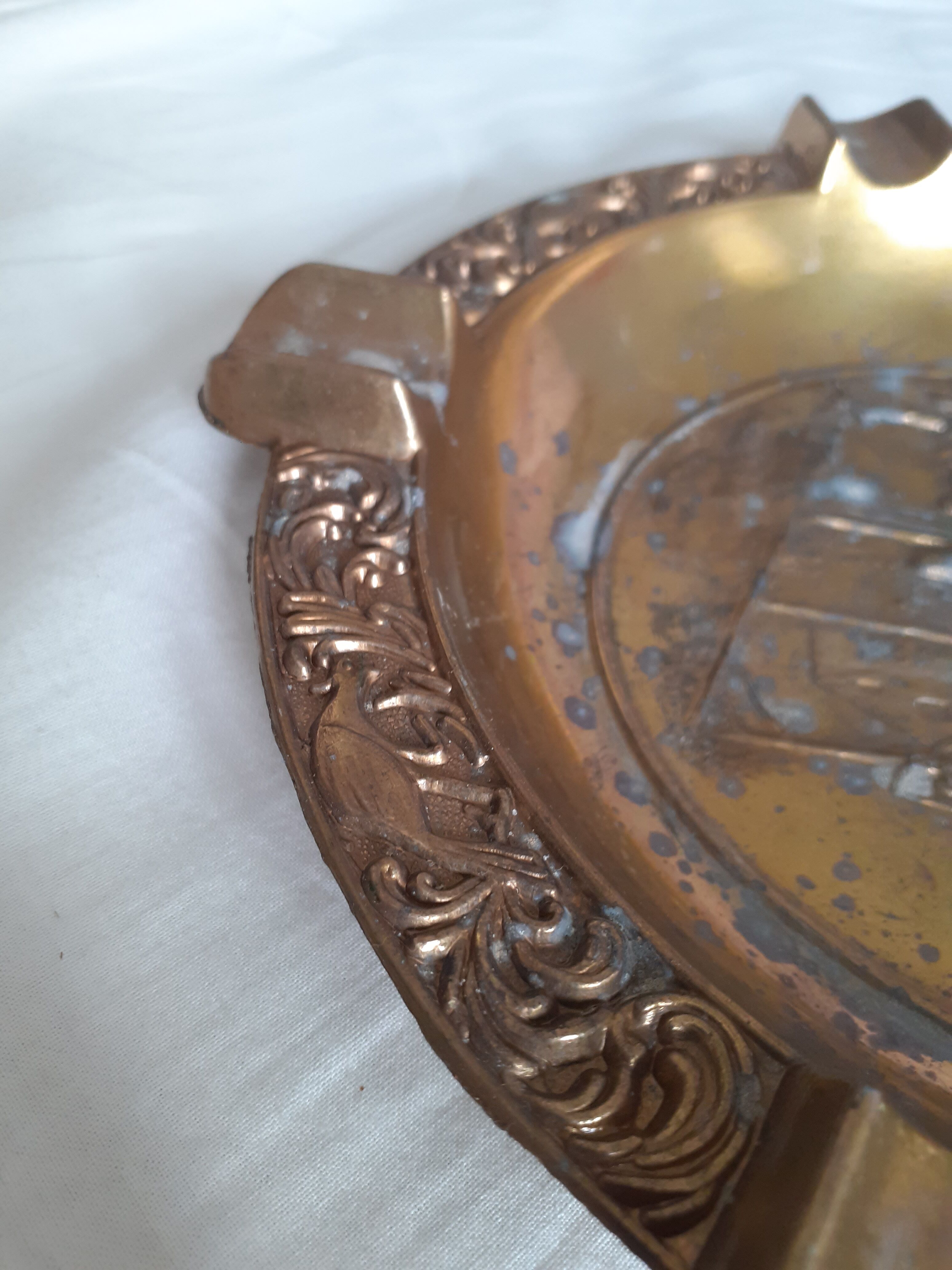 Golden metal ashtray