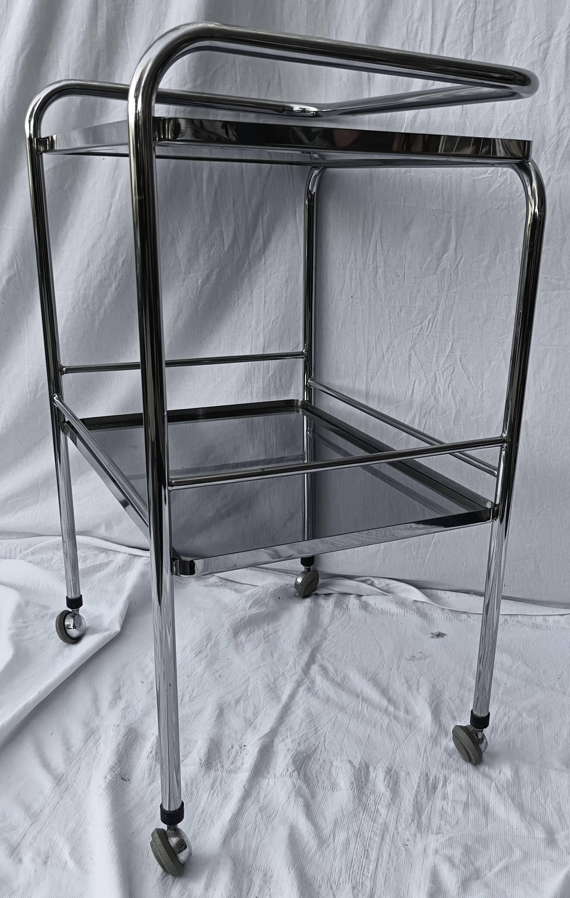 metal rolling dessert trolley: glass