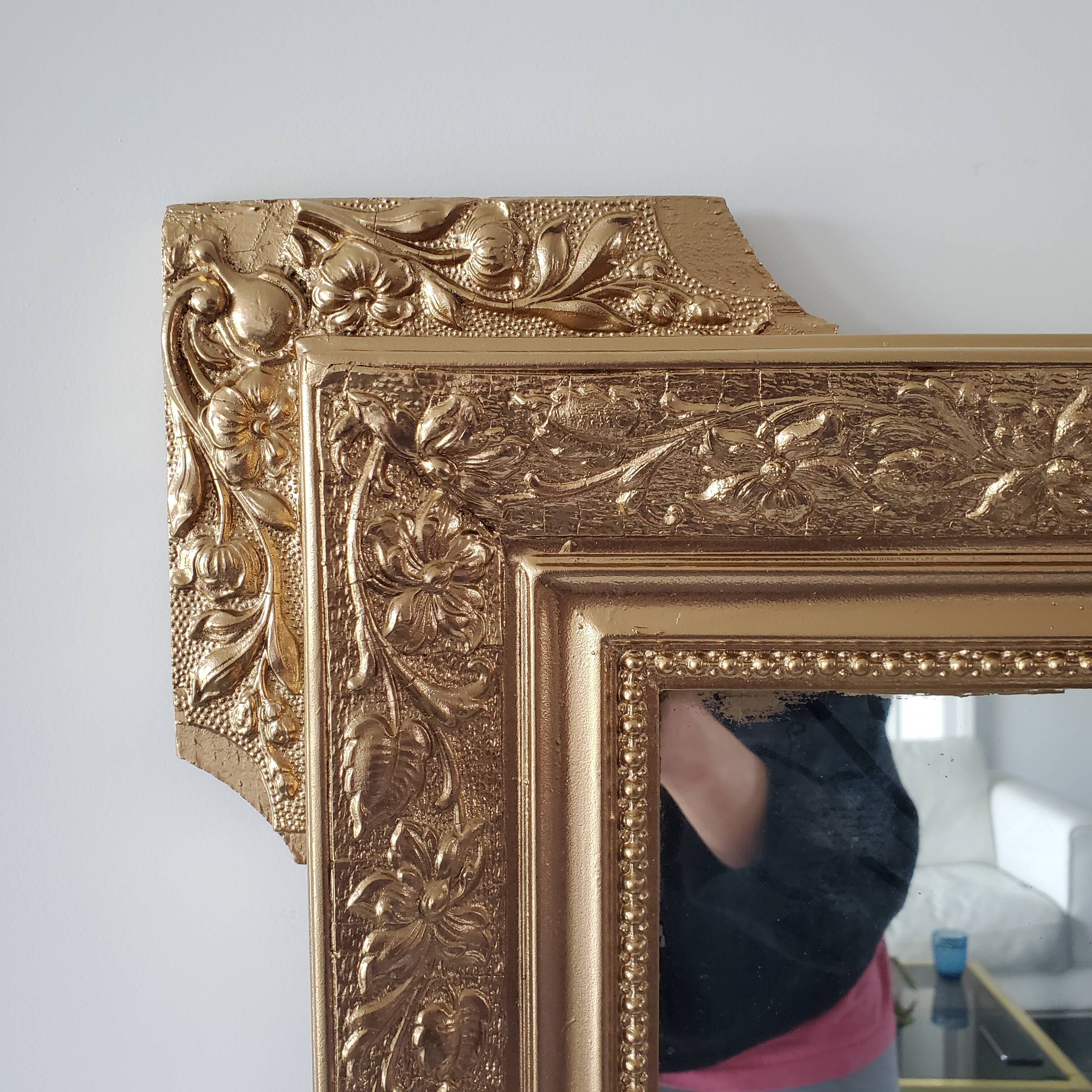 Antique mirror with gilded wood crests