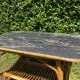 Table basse vintage en rotin et Formica