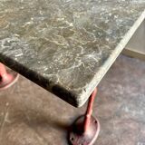 Grey marble and burgundy cast iron bistro table ☐ 85 x 57 cm