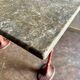 Grey marble and burgundy cast iron bistro table ☐ 85 x 57 cm