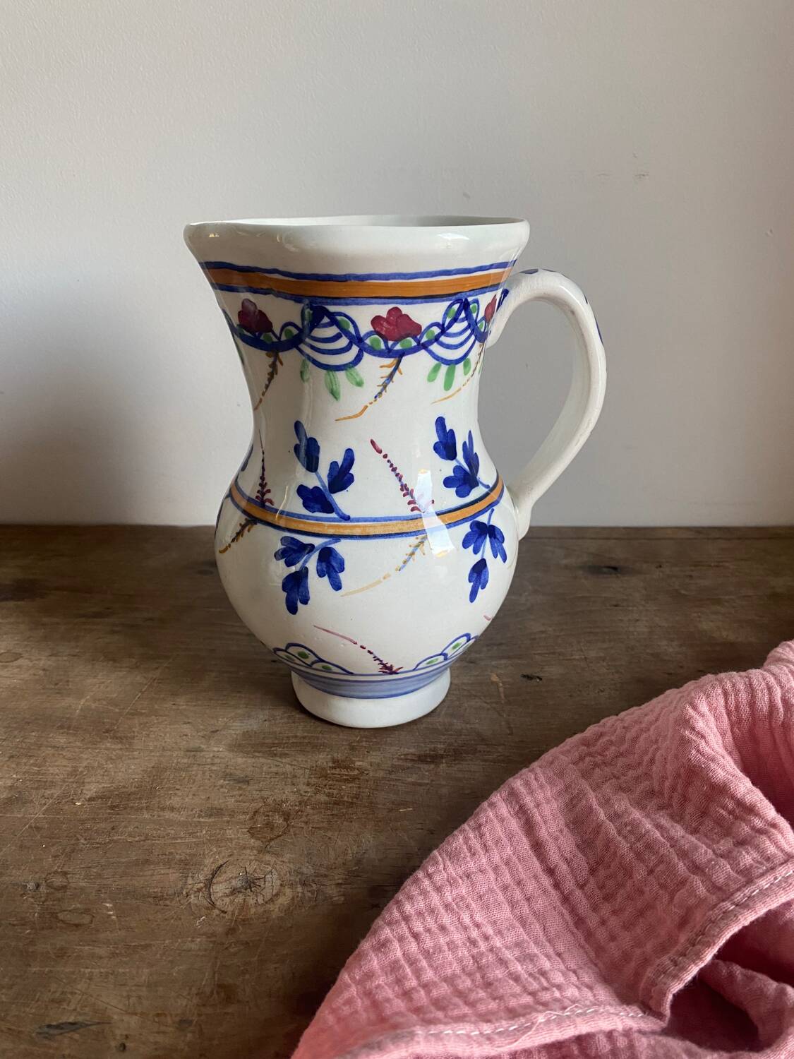 Small old ceramic pitcher