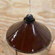 Industrial pendant light in brown and white enameled sheet metal