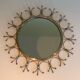 Sun mirror in brass and brushed steel
