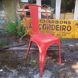 Old red Xavier Pauchard chair
