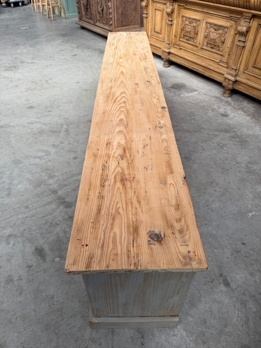 Old workshop furniture transformed into a TV unit.