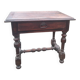 Small antique writing table in Louis XIII style made of oak.