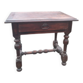 Small antique writing table in Louis XIII style made of oak.