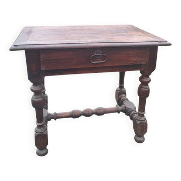 Small antique writing table in Louis XIII style made of oak.
