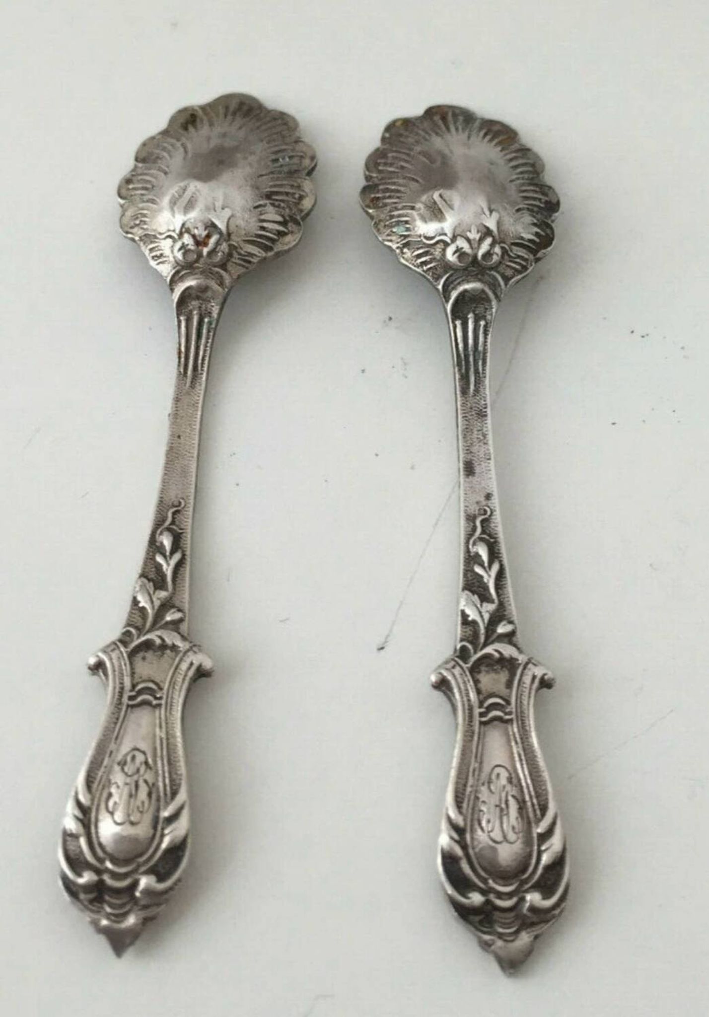 Beautiful pair of Louis XV style silver salt cellars