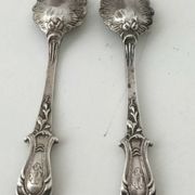 Beautiful pair of Louis XV style silver salt cellars