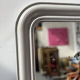 Louis Philippe mirror in wood and patinated stucco, 19th century