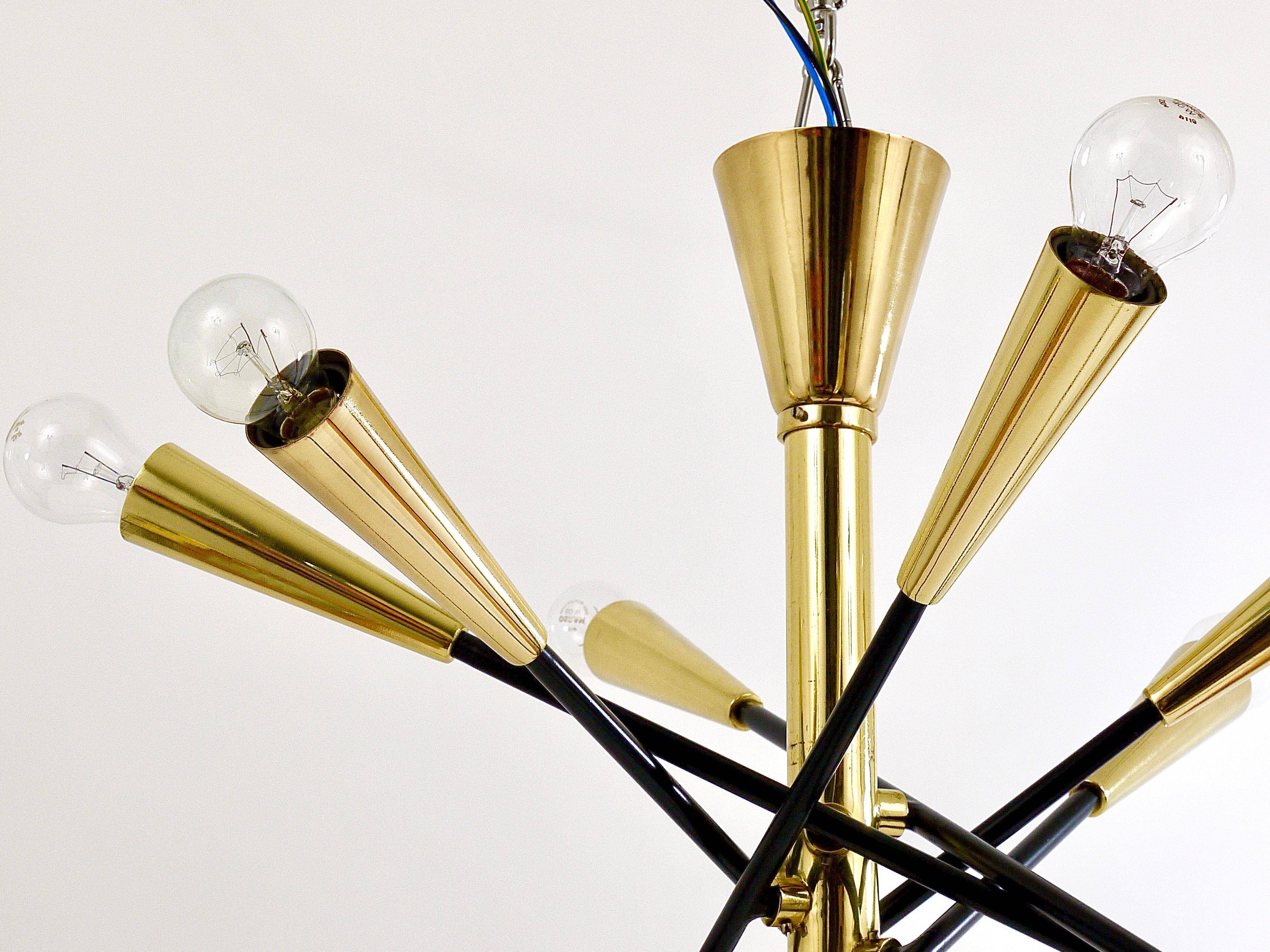 Black and brass articulated Sputnik chandelier in Stilnovo style, Italy, 1950.