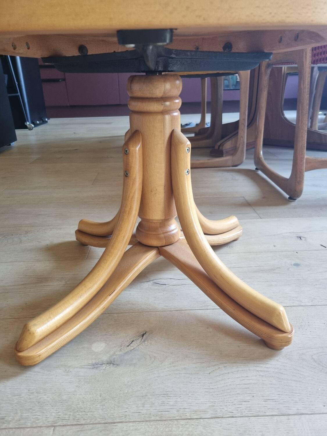 Wooden swivel armchair