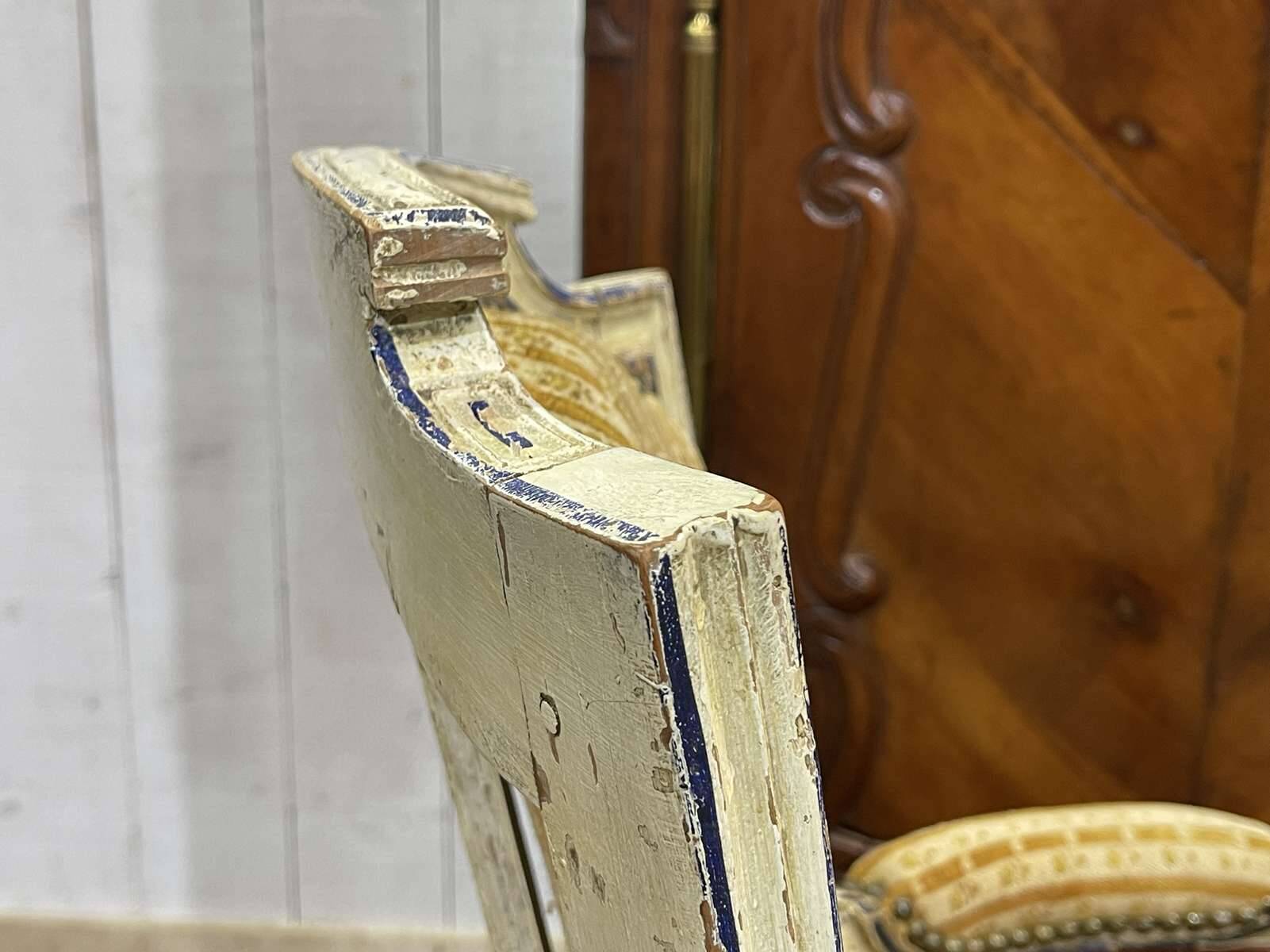 Pair of Louis XVI period cabriolet chairs in beech.