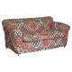 Victorian canapé upholstered in Kilim with turned mahogany legs.