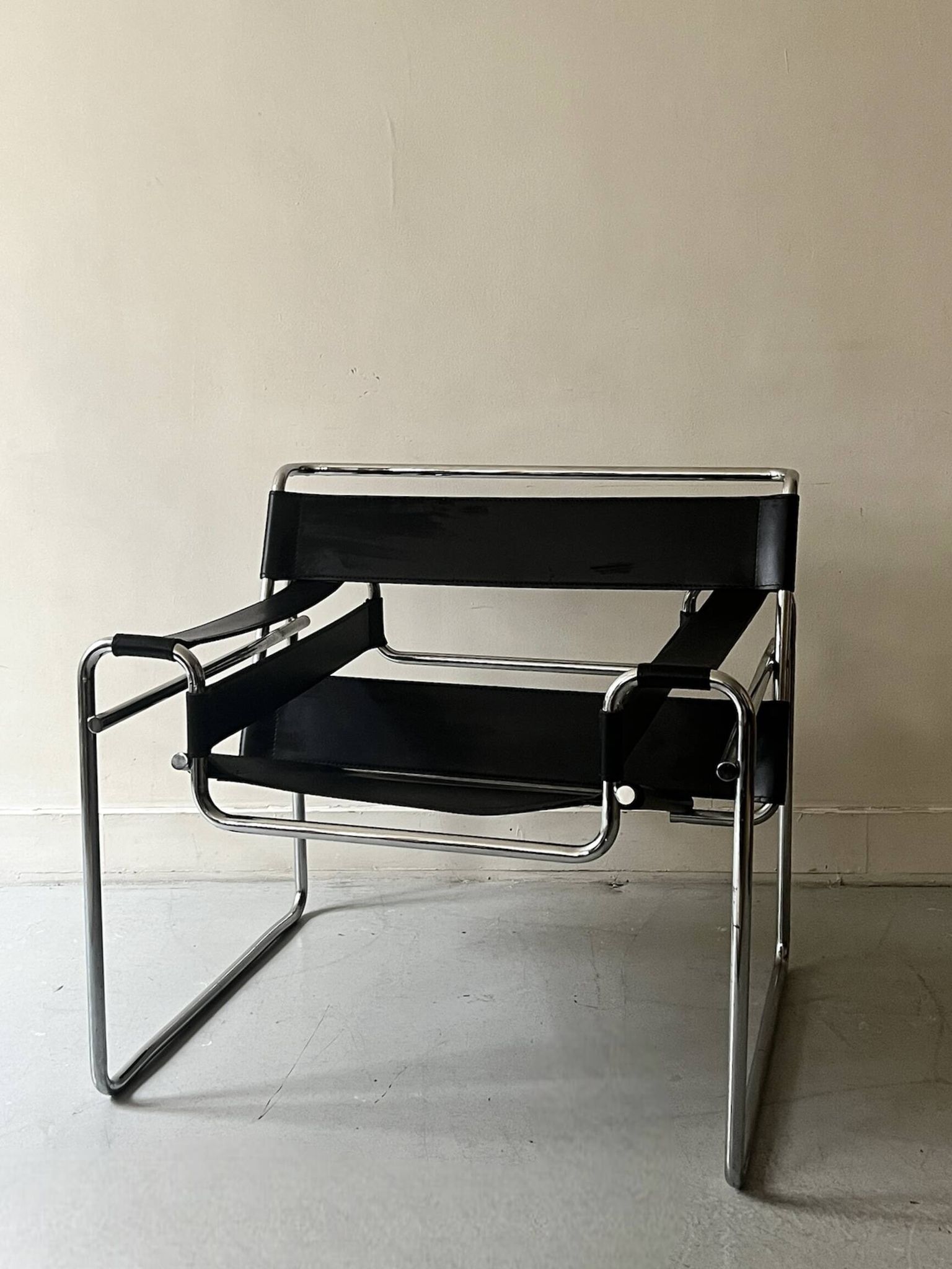 Wassily tubular armchair in chrome & black leather, designed by Marcel Breuer in 1970.