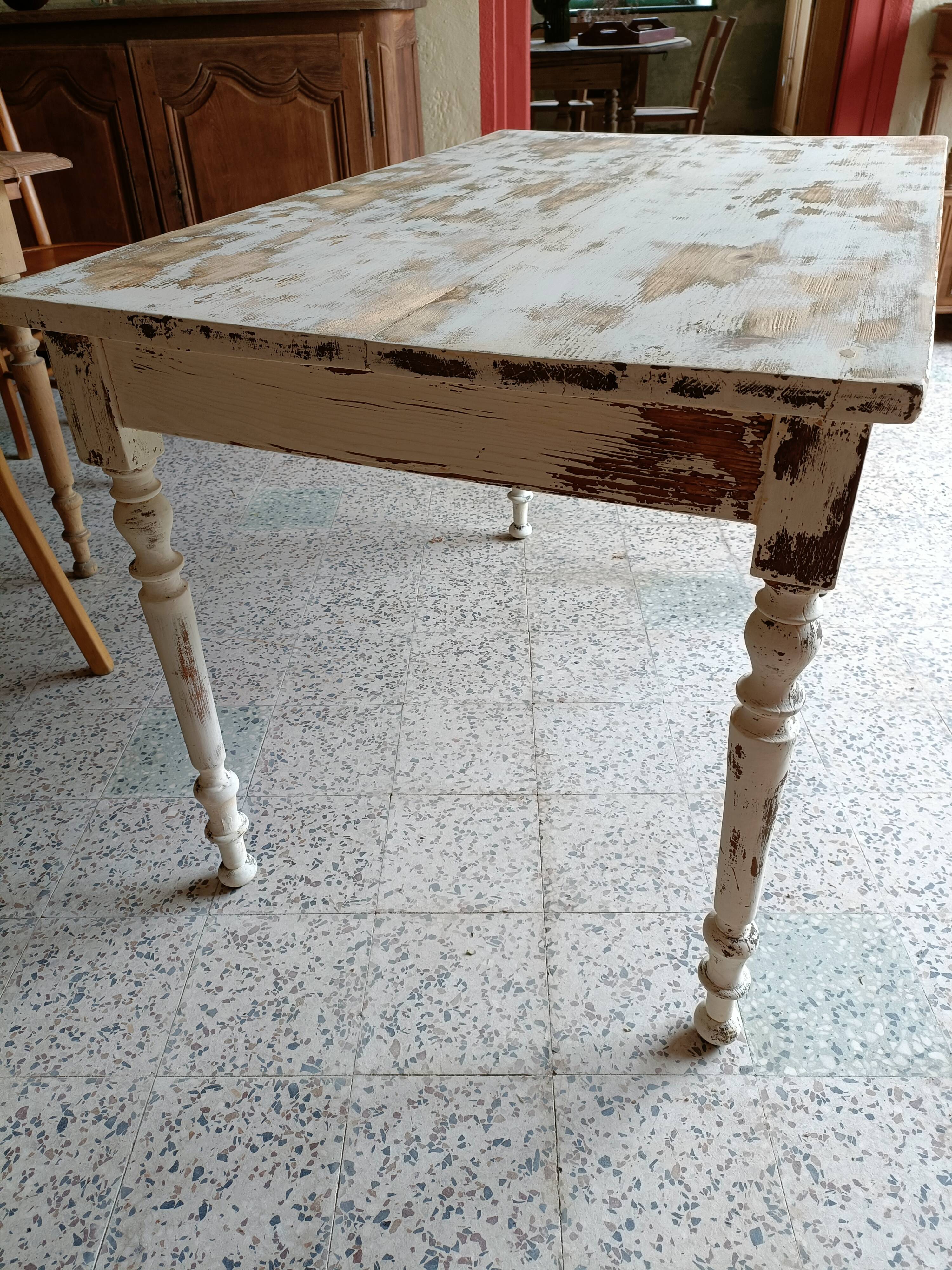 Patinated wooden table, restored.