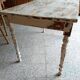 Patinated wooden table, restored.