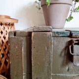Old green military crate or trunk