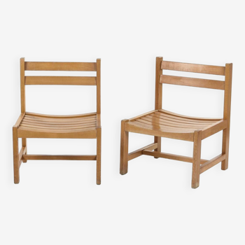 Pair of low chairs by André Sornay, circa 1960