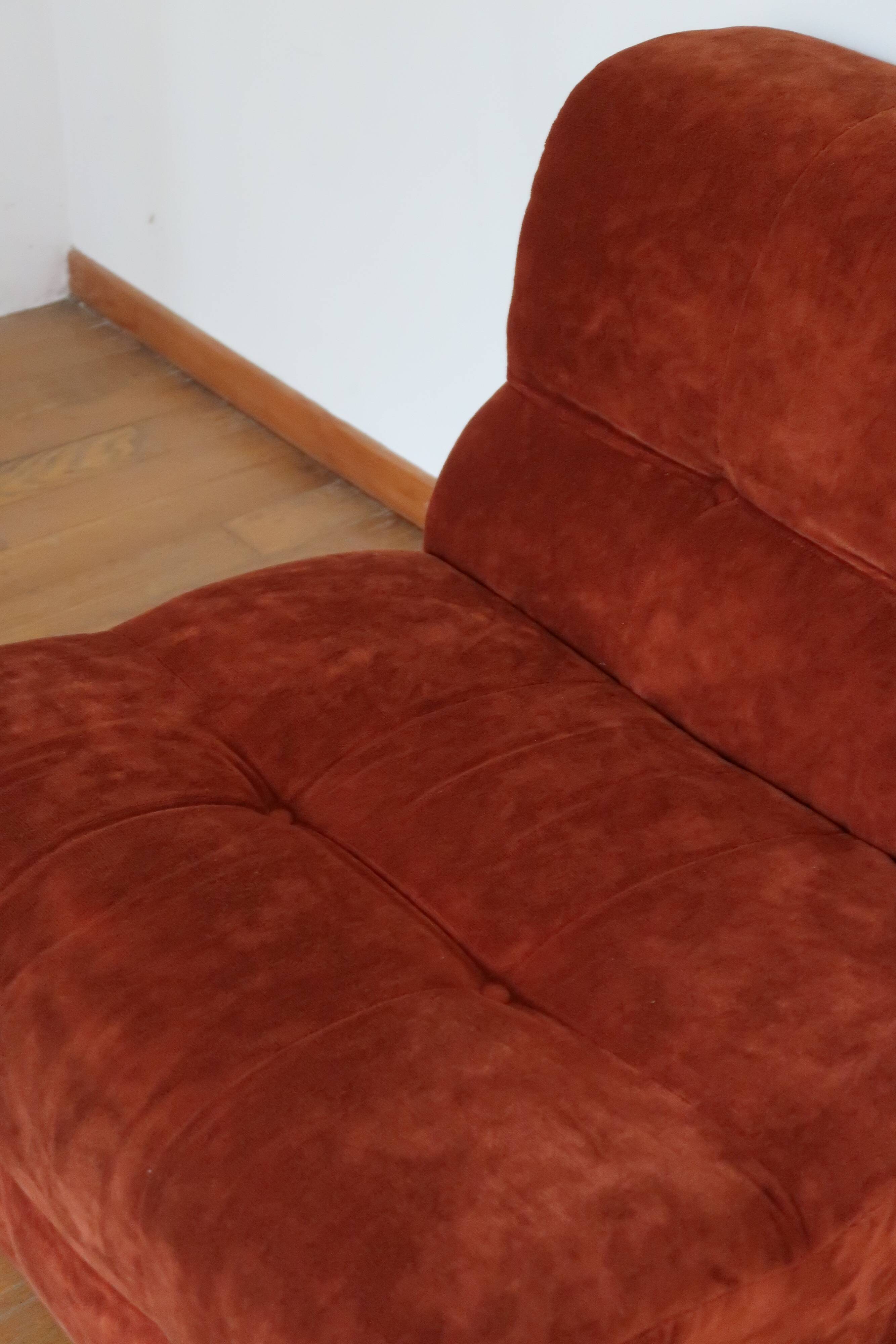 Rusty velvet low chair without arms