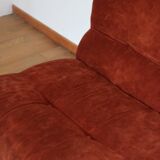 Rusty velvet low chair without arms